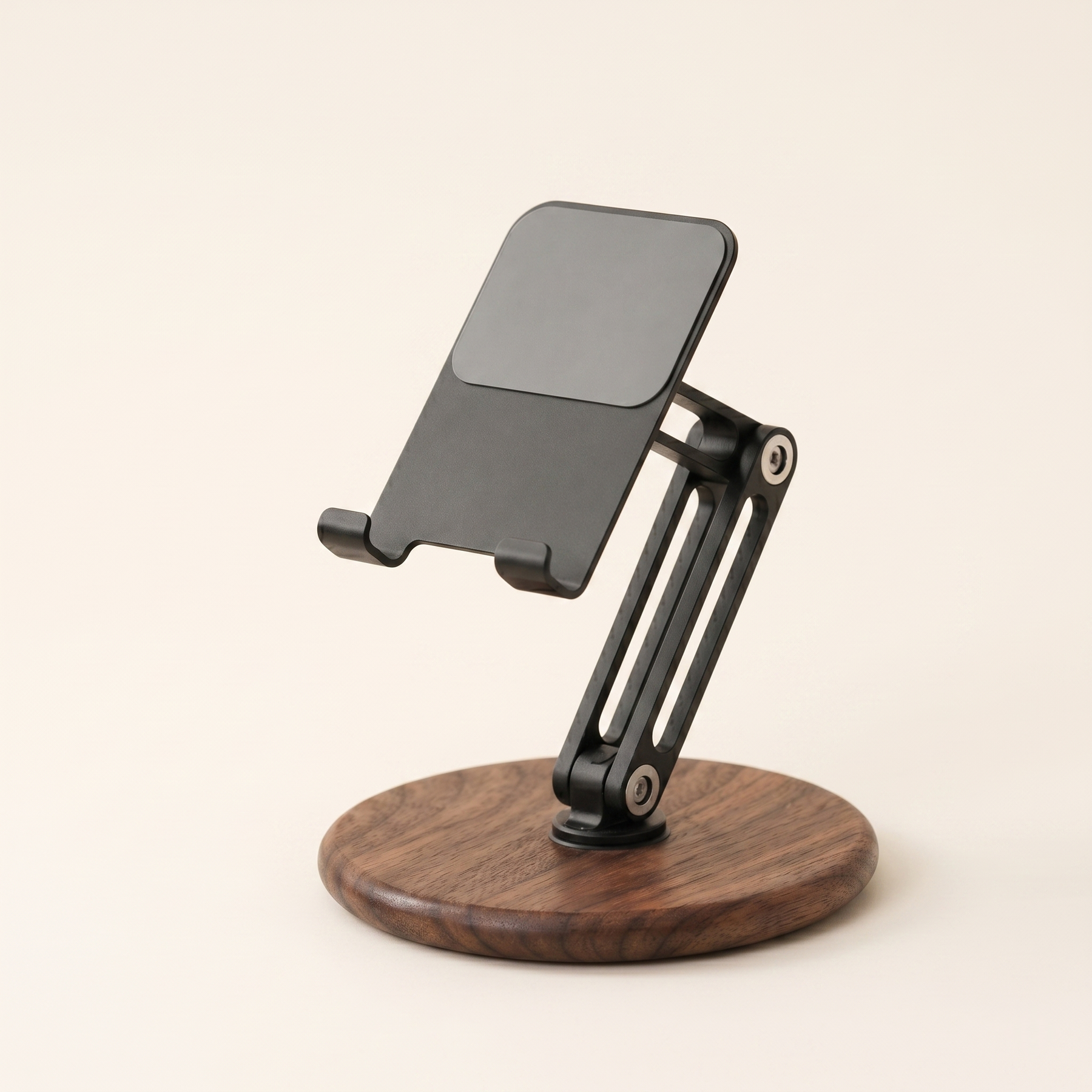 NORVEN adjustable walnut phone and tablet stand on a warm minimalist desk