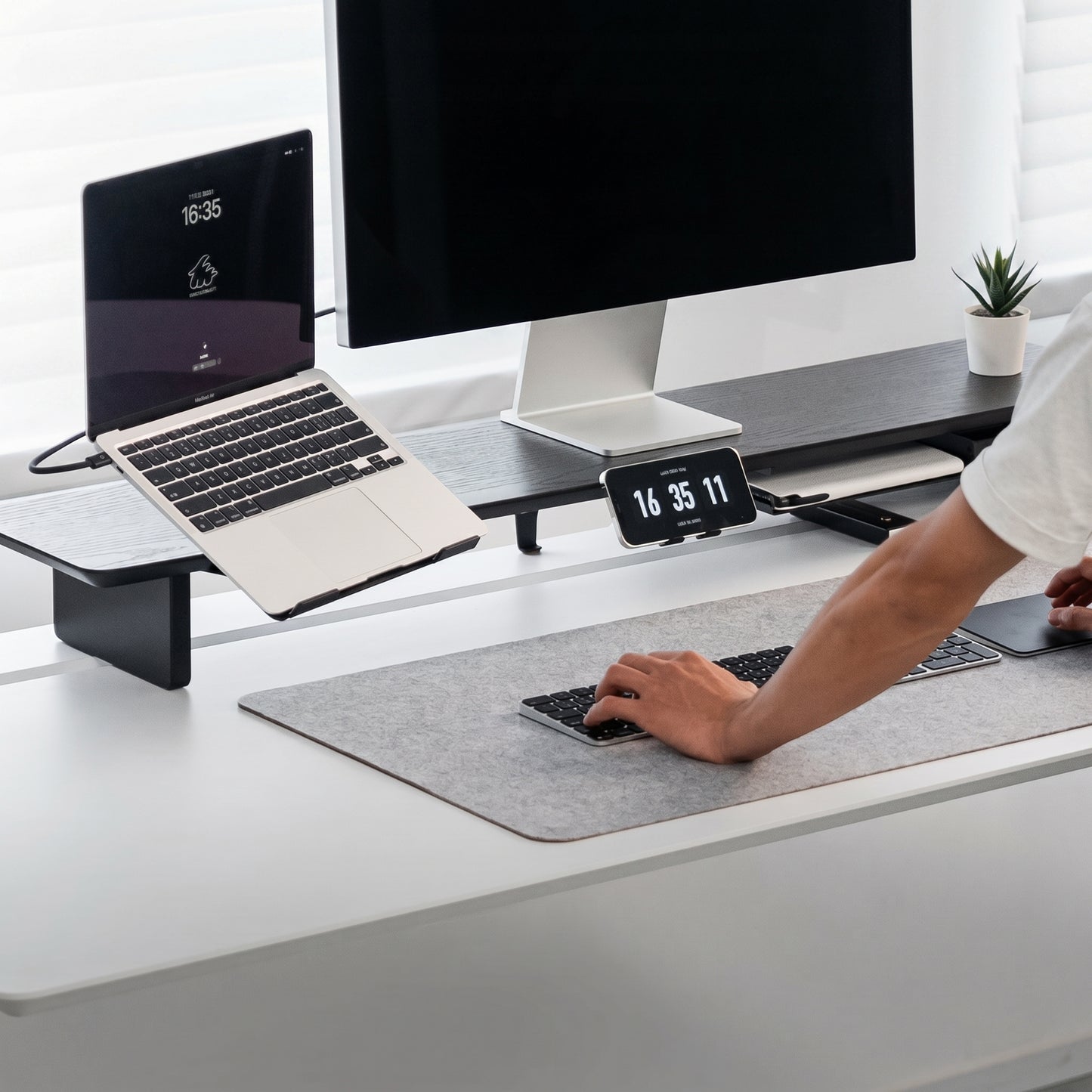 Cork side of reversible desk mat for a grounded minimalist desk setup
