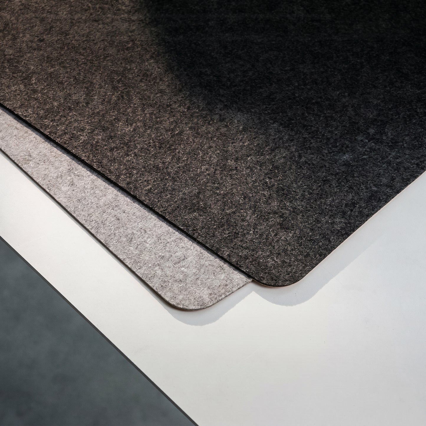 Soft felt surface of NORVEN reversible desk mat for quiet home office work