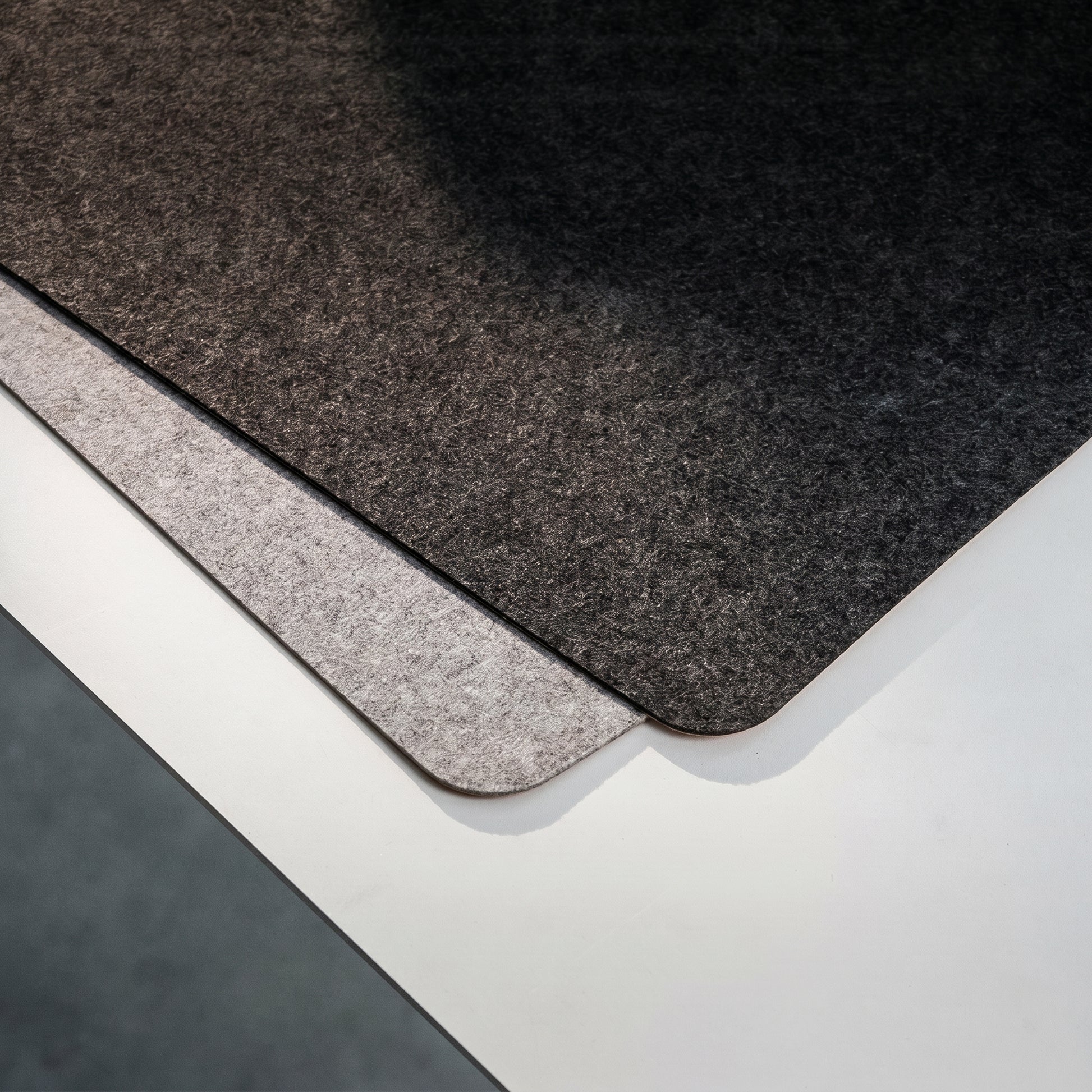Soft felt surface of NORVEN reversible desk mat for quiet home office work