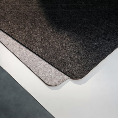 Soft felt surface of NORVEN reversible desk mat for quiet home office work